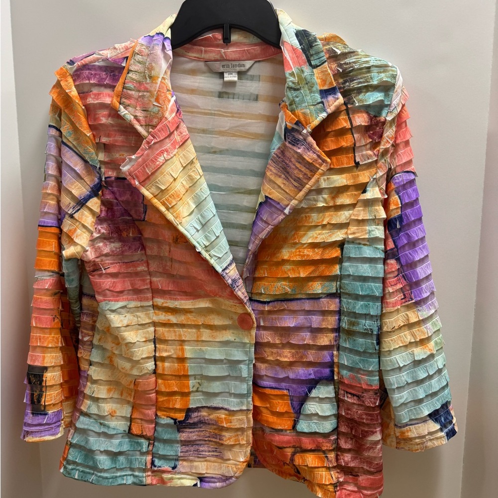 A colorful, textured jacket size pm
